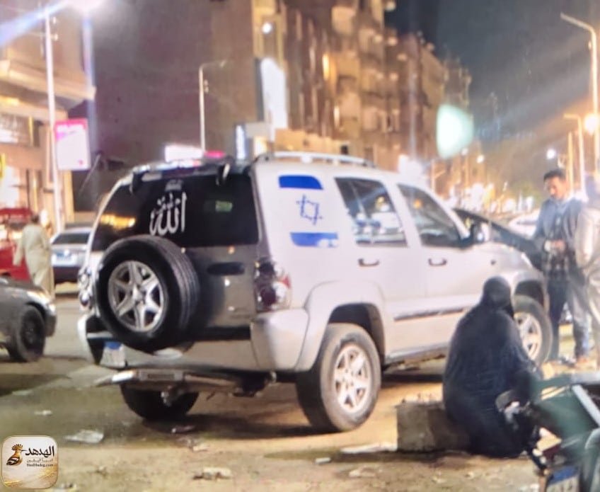 seARA2 سيارة بعلم إسرائيل في كرداسة